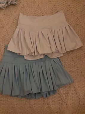 Pleated Mini Skirts in Light Blue and Pale Gray